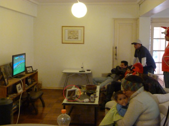 Photo of family watching the football